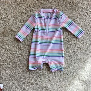 Baby gap rainbow stripe rash guard. Size 0-6 months